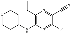 3-bromo-6-etil-5-((tetrahidro-2H-piran-4-il)amino)pirazin-2-karbonitril