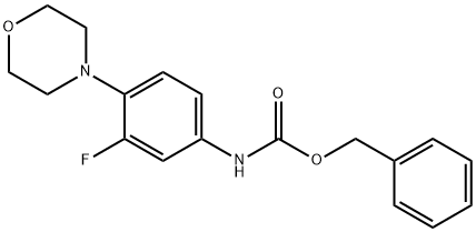 benzil ester3-Floro-4-morfolin-4-ilfenil)karbamik asit